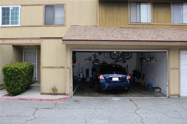 garage with driveway