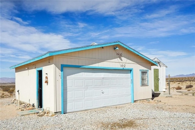 garage featuring a mountain view