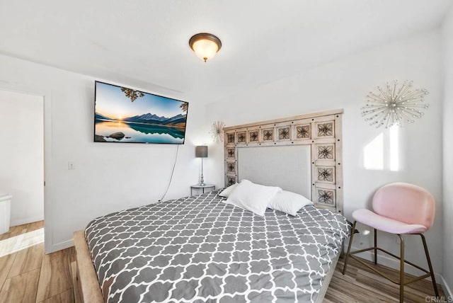 bedroom featuring light hardwood / wood-style flooring