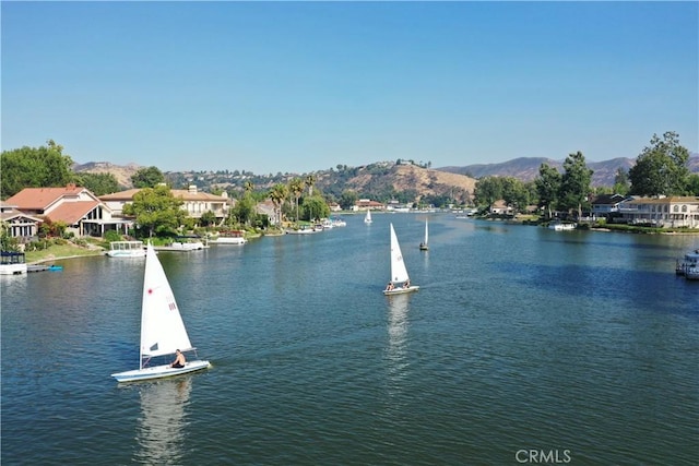 property view of water featuring a mountain view