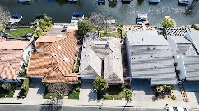 drone / aerial view featuring a water view