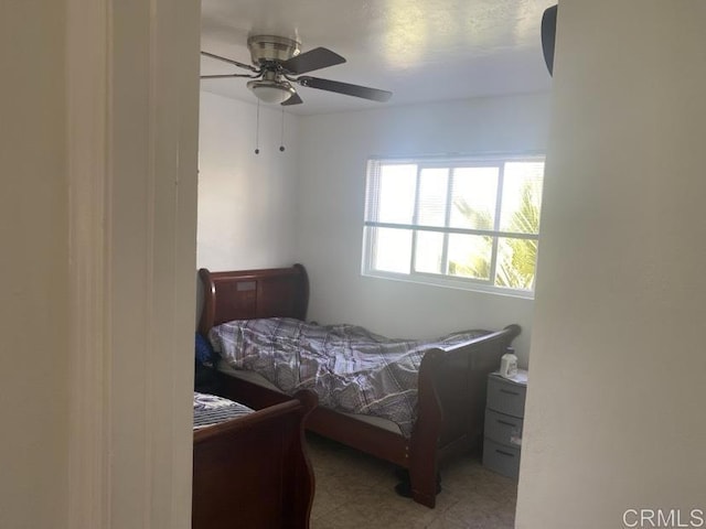 bedroom featuring ceiling fan