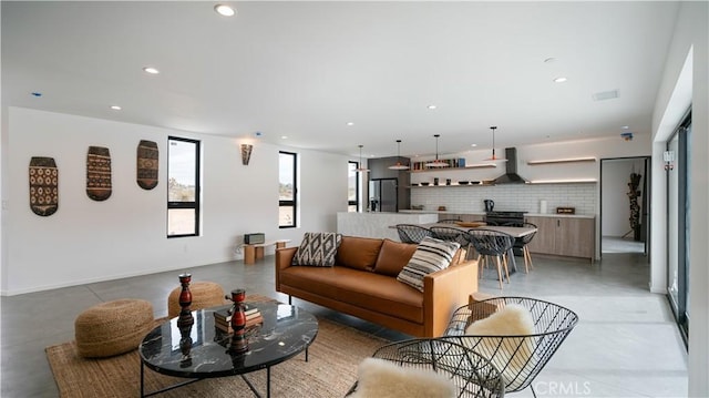 8750 Desert Shadows, Joshua Tree, CA 92252 - living area featuring recessed lighting and finished concrete flooring