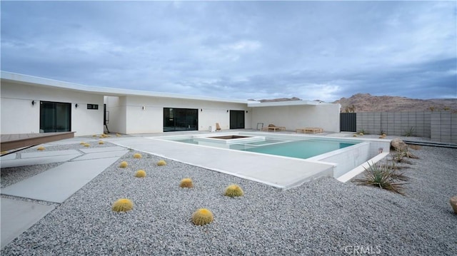 8750 Desert Shadows, Joshua Tree, CA 92252 - view of swimming pool with a patio area and a pool with connected hot tub