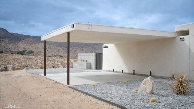 8750 Desert Shadows, Joshua Tree, CA 92252 - view of patio / terrace with a mountain view