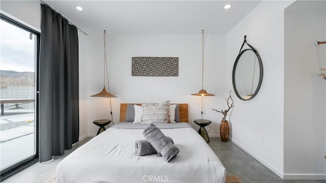 8750 Desert Shadows, Joshua Tree, CA 92252 - bedroom with finished concrete flooring, baseboards, recessed lighting, and access to outside