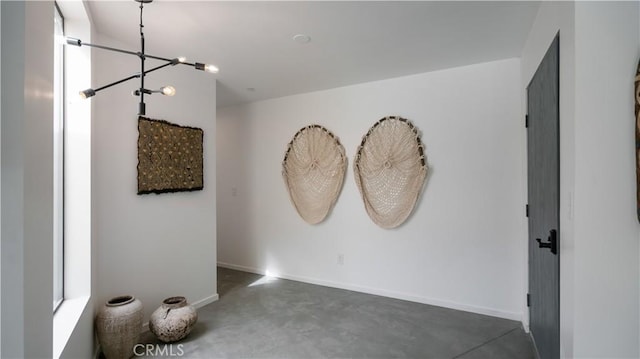 8750 Desert Shadows, Joshua Tree, CA 92252 - empty room with concrete flooring and baseboards