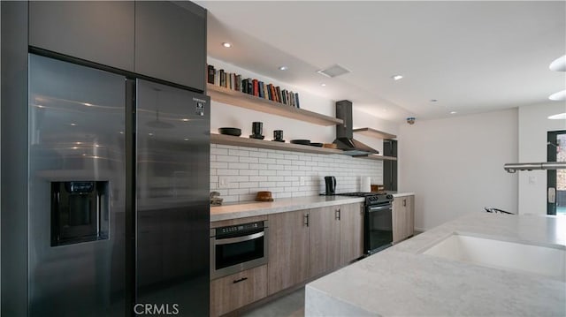 8750 Desert Shadows, Joshua Tree, CA 92252 - kitchen featuring stainless steel appliances, open shelves, modern cabinets, decorative backsplash, and island range hood