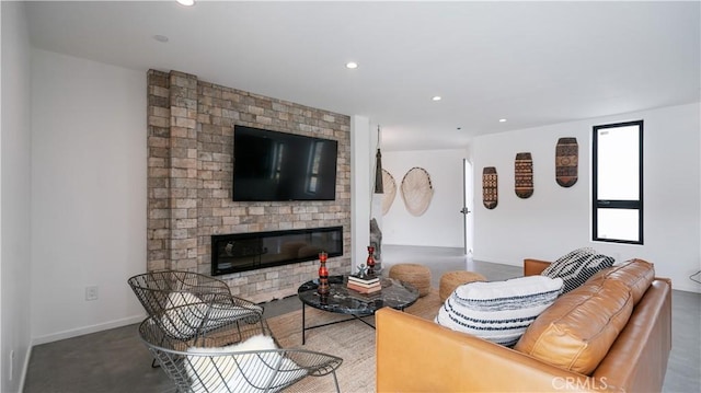 8750 Desert Shadows, Joshua Tree, CA 92252 - living area with a fireplace, recessed lighting, and baseboards