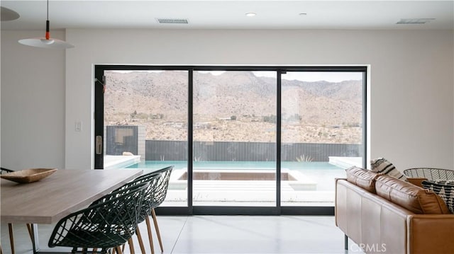 8750 Desert Shadows, Joshua Tree, CA 92252 - dining area featuring a mountain view and plenty of natural light