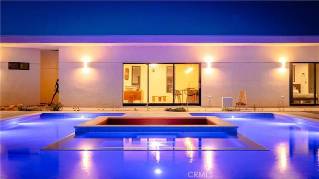 8750 Desert Shadows, Joshua Tree, CA 92252 - pool at twilight with a pool with connected hot tub