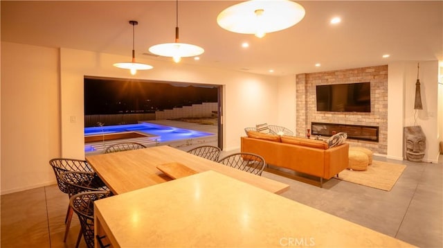 8750 Desert Shadows, Joshua Tree, CA 92252 - living room featuring a fireplace and recessed lighting