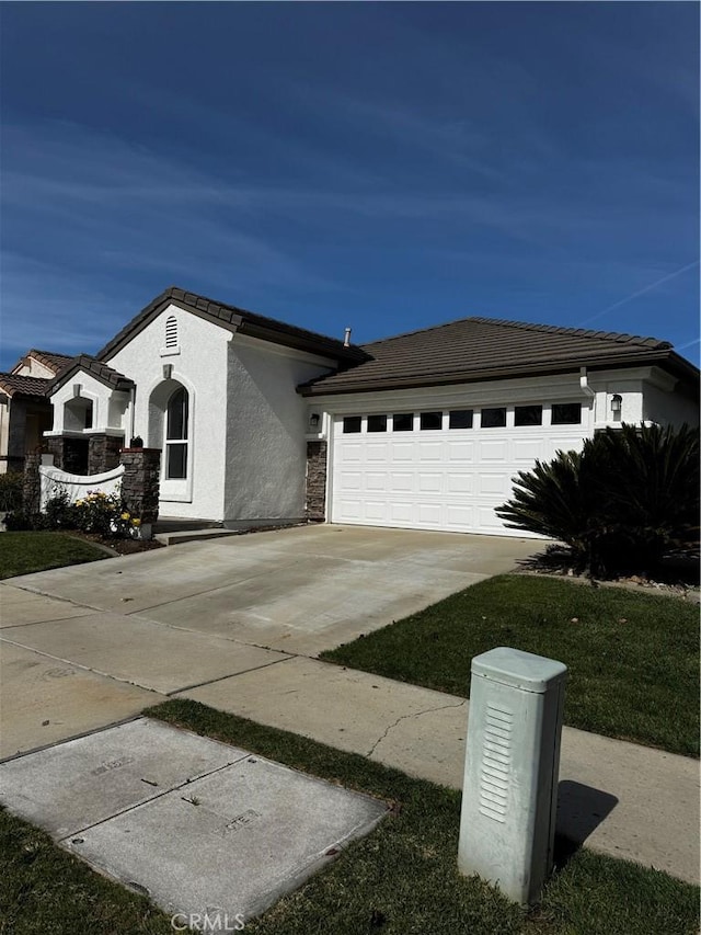 view of front of home with a garage