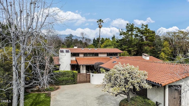 mediterranean / spanish home with a mountain view