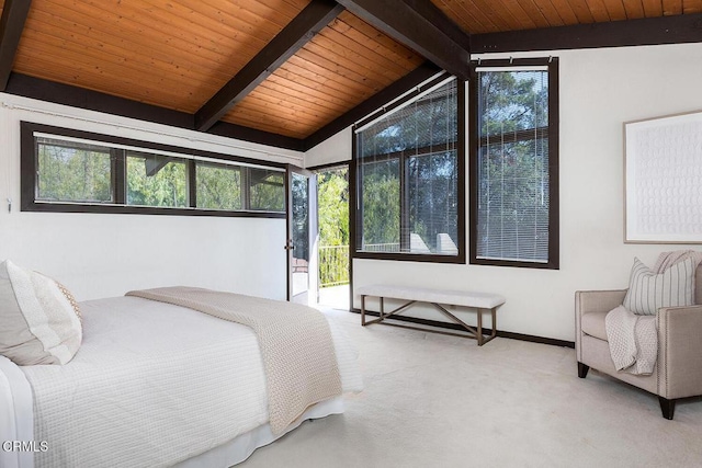 carpeted bedroom featuring vaulted ceiling with beams, multiple windows, and wooden ceiling