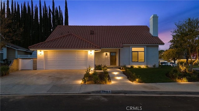 view of front of home with a garage