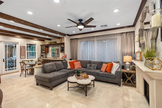 living room with visible vents, ceiling fan, ornamental molding, beam ceiling, and recessed lighting