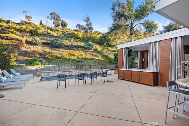 view of patio with fence