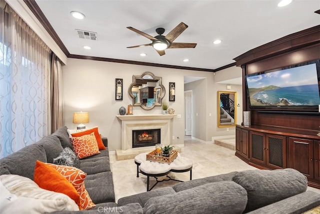 cinema with baseboards, visible vents, crown molding, a fireplace, and recessed lighting