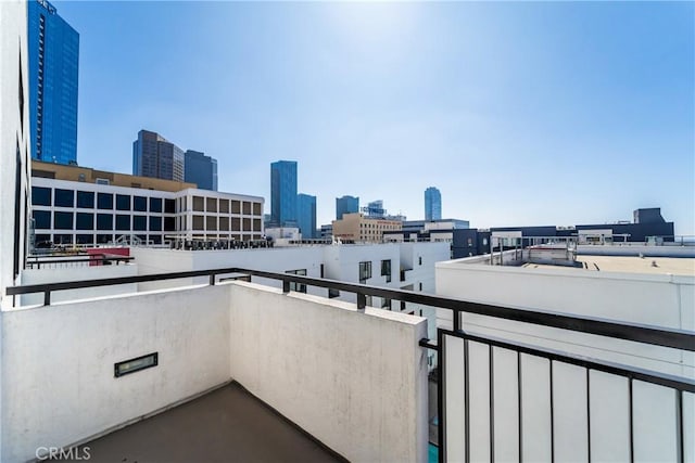 balcony featuring a city view