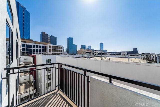 balcony featuring a city view