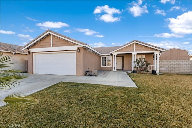 single story home featuring a front yard and a garage