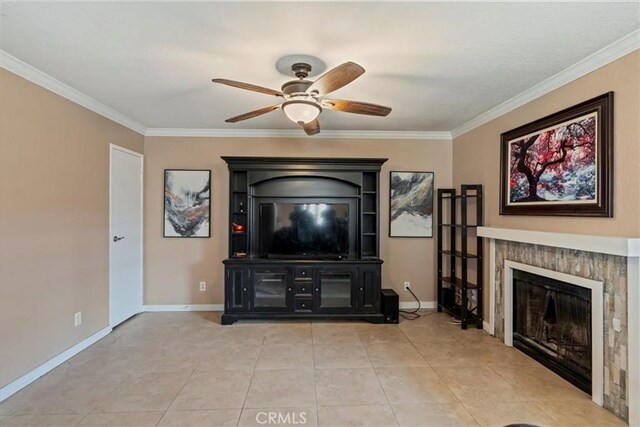 10151 Arrow Rte Unit 123, Rancho Cucamonga, CA 91730 - living room with ceiling fan, ornamental molding, a glass covered fireplace, baseboards, and light tile patterned flooring