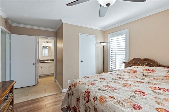 10151 Arrow Rte Unit 123, Rancho Cucamonga, CA 91730 - bedroom featuring light wood finished floors, crown molding, multiple windows, ensuite bathroom, and a ceiling fan
