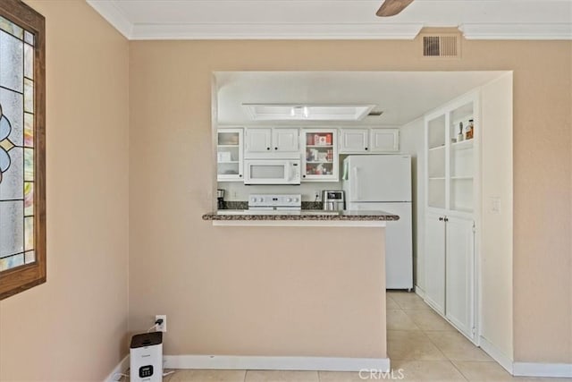 kitchen with visible vents, glass insert cabinets, ornamental molding, white cabinets, and white appliances