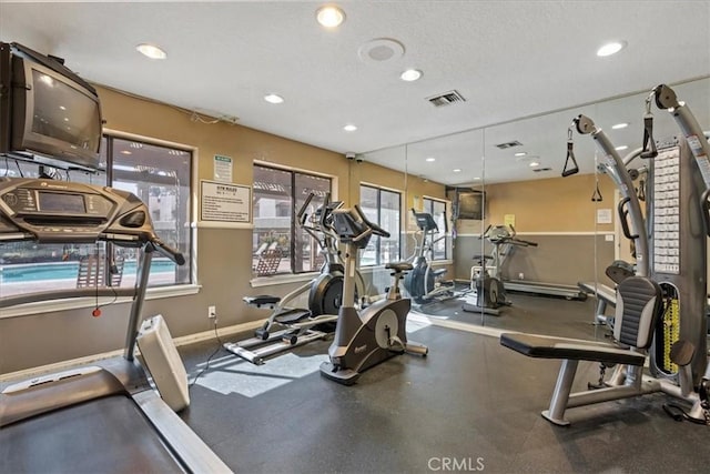 10151 Arrow Rte Unit 123, Rancho Cucamonga, CA 91730 - workout area with baseboards, recessed lighting, and a textured ceiling