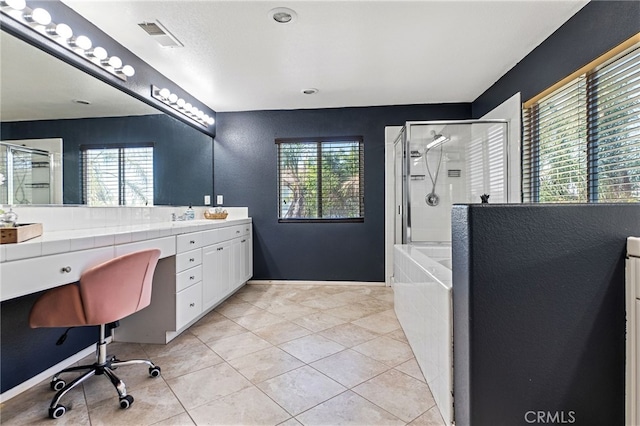 full bath featuring visible vents, a healthy amount of sunlight, a shower stall, and vanity