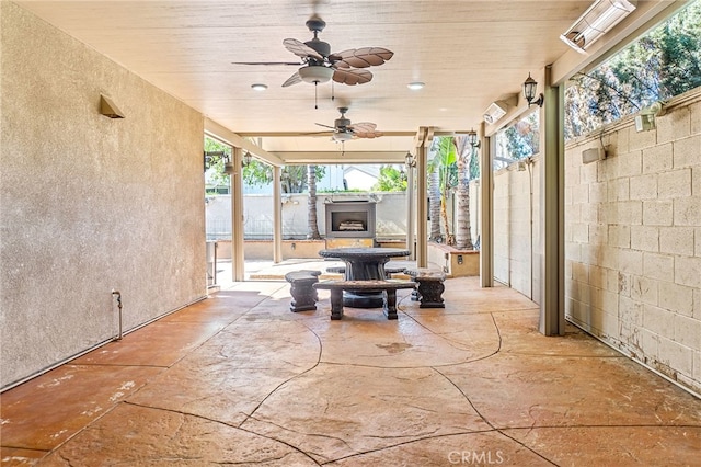 view of patio featuring a fenced backyard and a ceiling fan