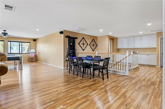 dining space featuring light wood-style flooring, visible vents, and recessed lighting