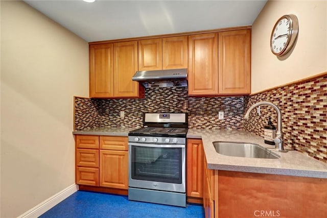 kitchen featuring sink, tasteful backsplash, and stainless steel range with gas stovetop