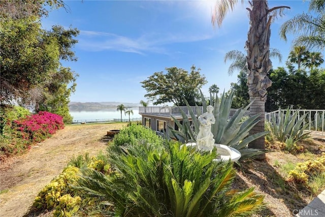 view of yard with a water view