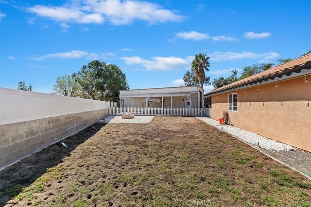 view of yard with a fenced backyard