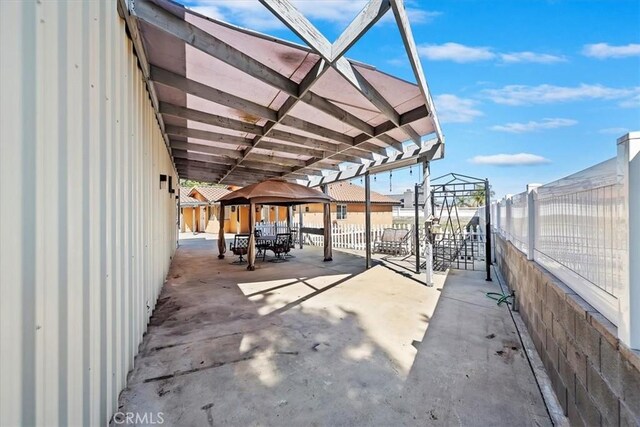 view of patio featuring a fenced backyard and a pergola