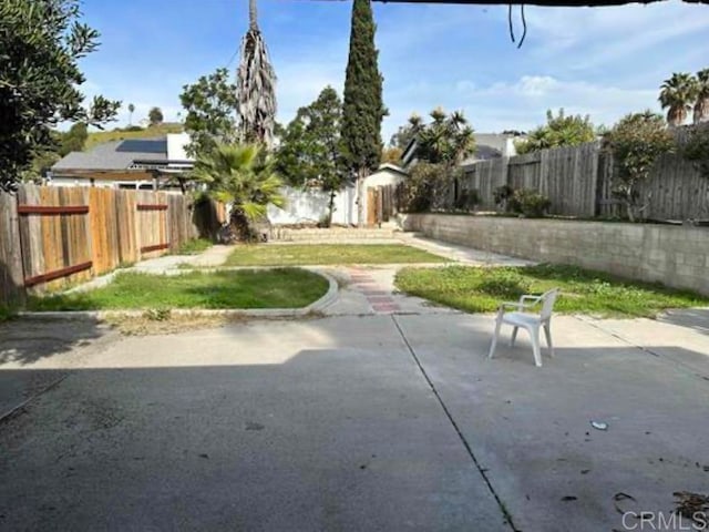 view of yard with a patio area