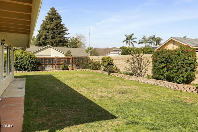 view of yard with fence