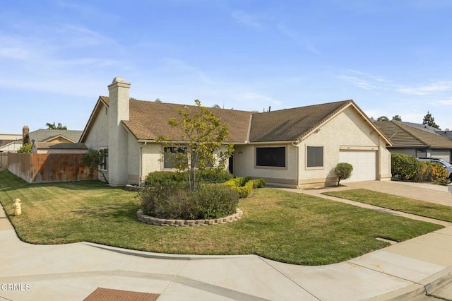 ranch-style house with a front yard, fence, driveway, an attached garage, and stucco siding