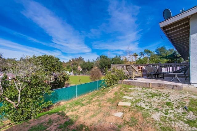 view of yard featuring an outdoor fire pit and a patio area