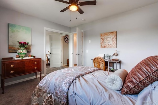 bedroom with ceiling fan and dark colored carpet