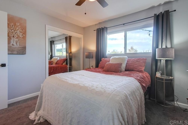 carpeted bedroom with a closet and ceiling fan