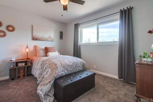 bedroom featuring dark carpet and ceiling fan