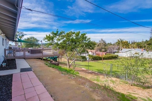 view of yard with a deck