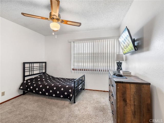 carpeted bedroom with a textured ceiling