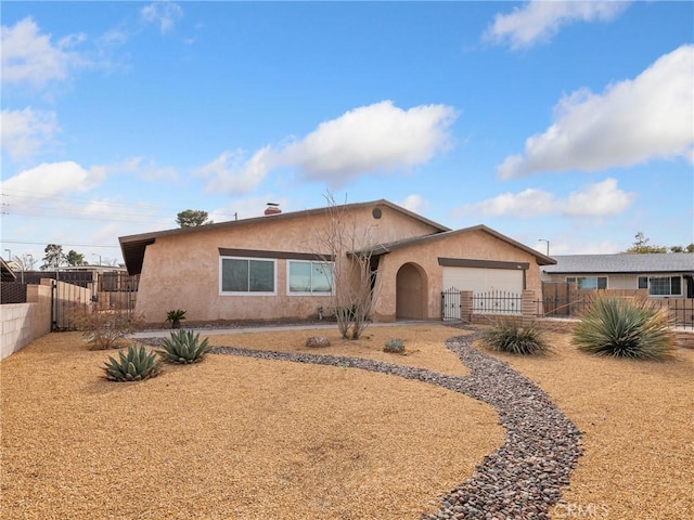 single story home featuring a garage