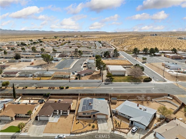 bird's eye view with a mountain view