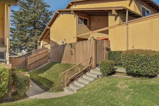 view of property exterior featuring a yard