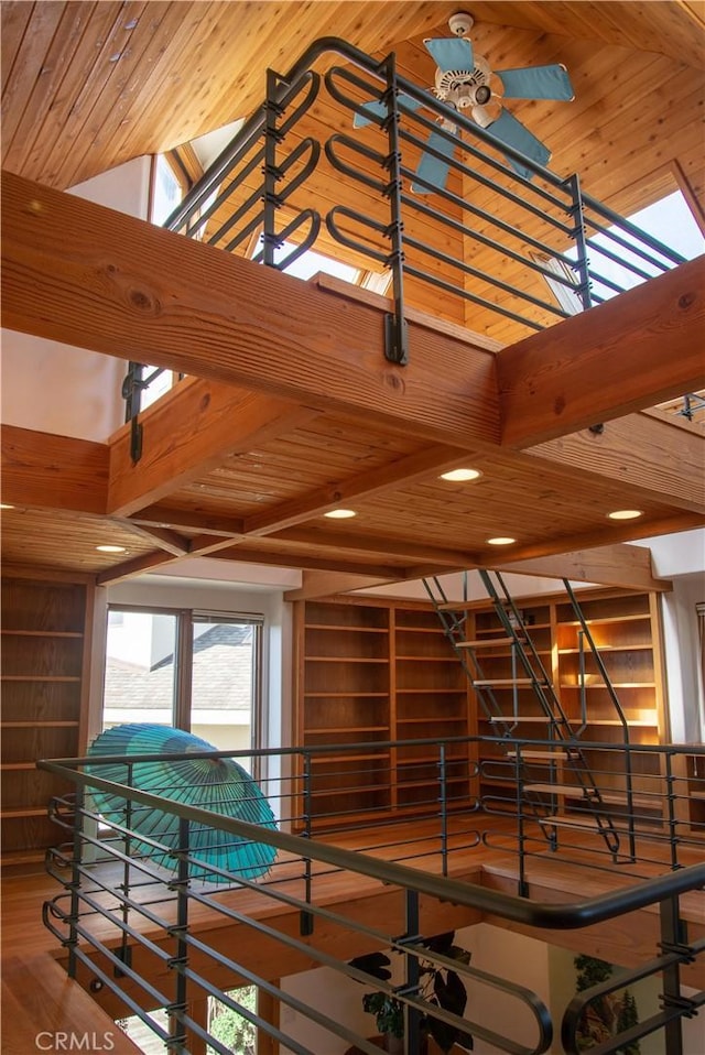 details featuring recessed lighting, wooden walls, wood finished floors, wood ceiling, and beamed ceiling